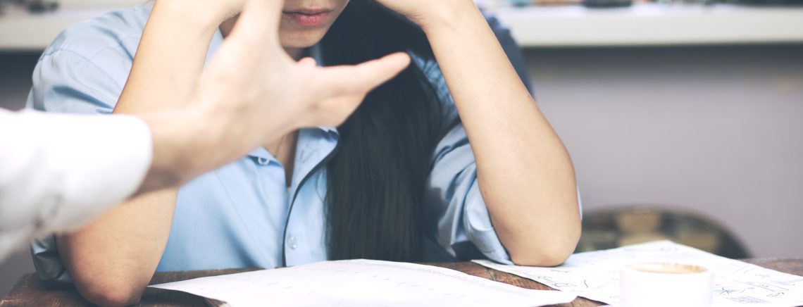 Boss threatening with finger his employee, isolated